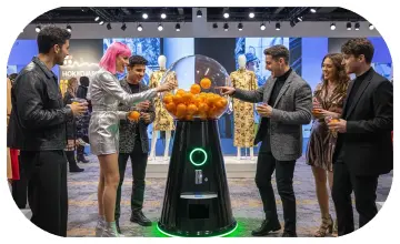 Interactive Gumball Machine at a Dubai brand activation event. Guests are playing and engaging with the sleek machine, creating memorable experiences.